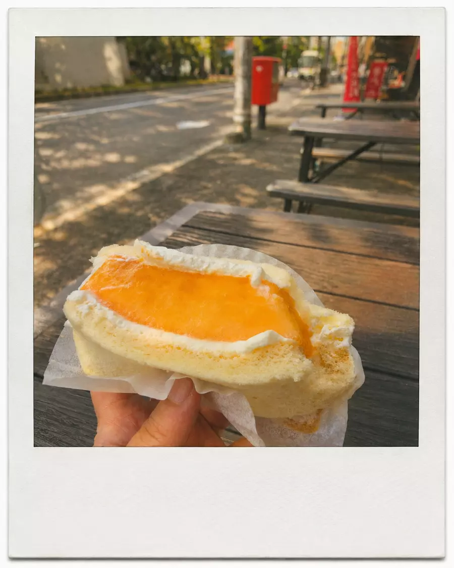 The same snapshot transformed into a warm summer Polaroid with faded Kodak colors
